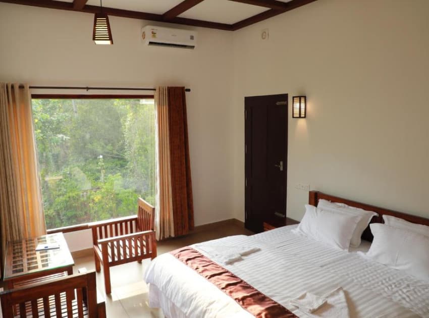 Book Double Room With Balcony room in Thekkady