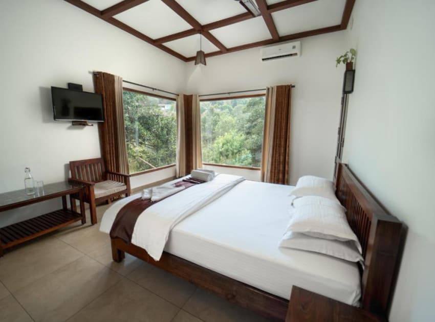Book Double Room With Balcony room in Thekkady