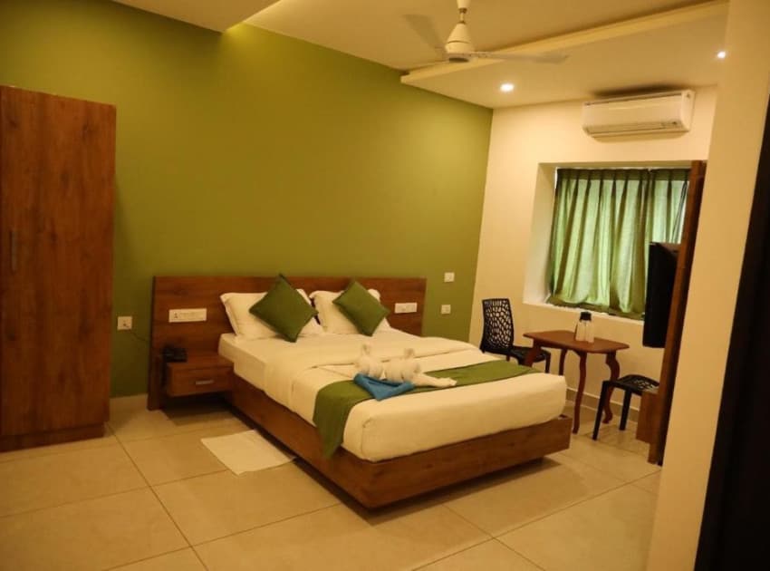 Book Double Room with Balcony room in Wayanad